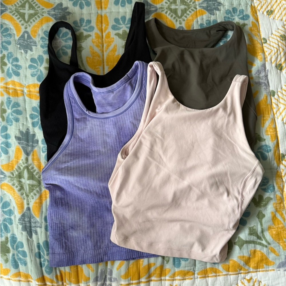 4 gently worn Lululemon cropped tanks - all size 4